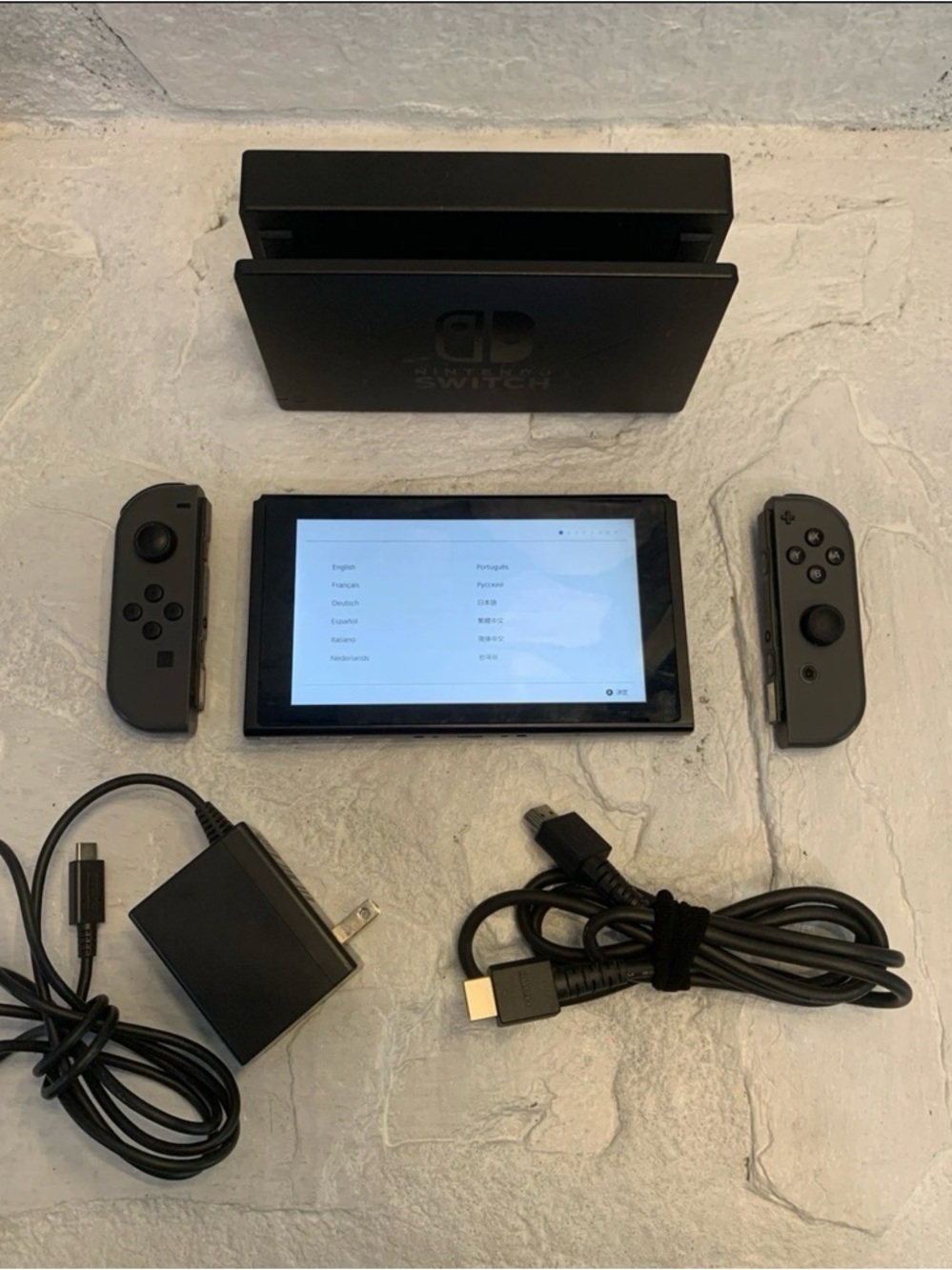 Nintendo Switch Console with Black Joy‑Con Controllers